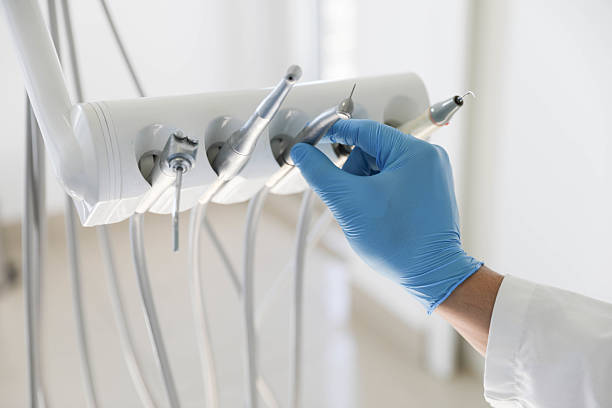 Professional Emergency Dentist technician working in Marquette, MI